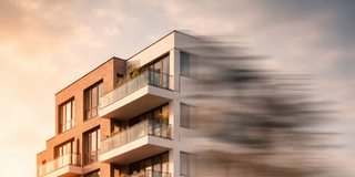 Bild zeigt einen Neubau (Mehrfamilienhaus)